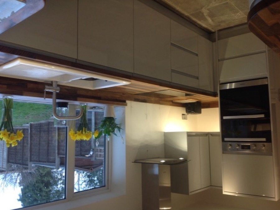 A finished kitchen makeover with cream slab doors